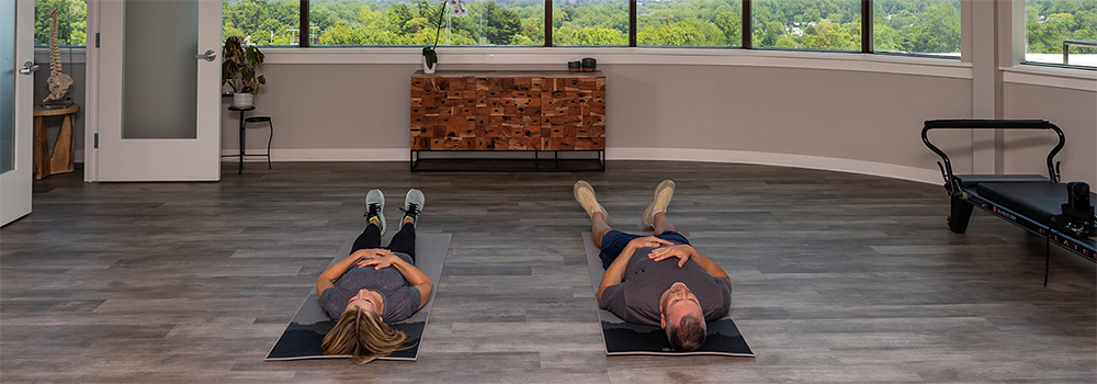 Physical therapy studio with two people
